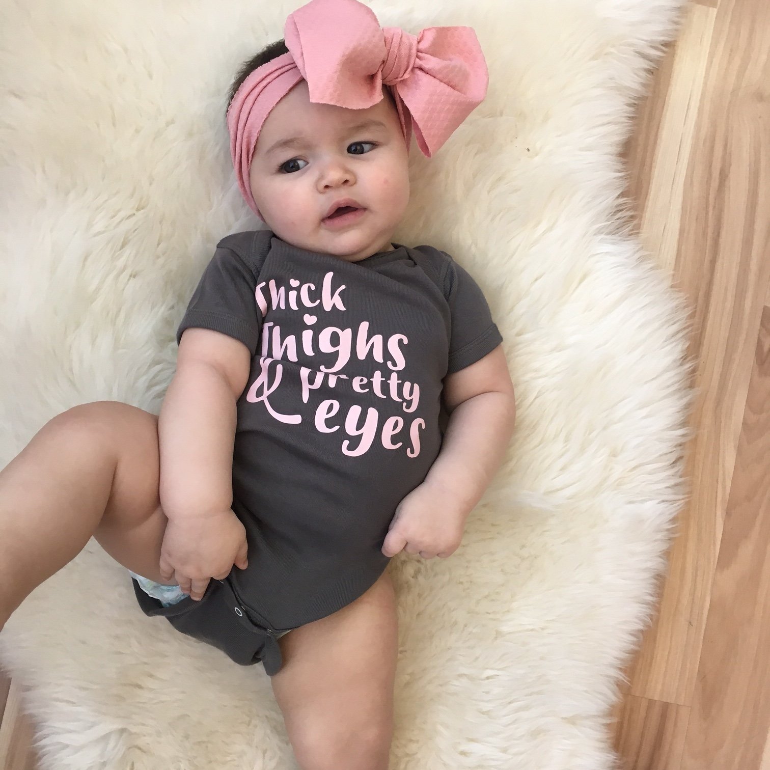 Thick Thighs & Pretty Eyes Onesie